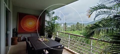 PHUKET A KARON 8 MINUTEN VAN HET STRAND CONDO met ingerichte keuken, woonkamer, woonkamer, 2 slaapkamers met doucheruimte, wasruimte, terras. BEVEILIGDE RESIDENTIE, ZWEMBAD, FITNESSRUIMTE, GARAGE. PRIJS 12.5 M BAHT (329 000 €) IMMOCENTER + CONTACTEER...