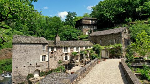 The water mill and its outbuildings, which date back to 1850, are set in a private corner of paradise on the border of the Tarn and Aveyron departments in the Southwest of France and have been tastefully restored between 2010 and 2020. As you step th...