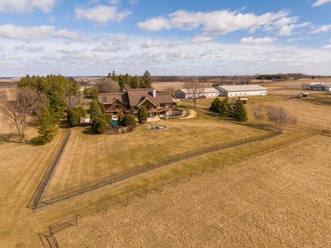 This 320-acre horse property includes a 6800+ square foot log home built in 1992 with 5 bedrooms and 6 bathrooms. It features a spacious executive kitchen, a great room with a stone fireplace, and a sunroom. Beautiful decking overlooking an in-ground...