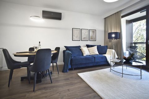 An apartment decorated in a modern and neutral style in the prestigious location of Marina Mokotów in Upper Mokotów. Marina Mokotów is a quiet and beautifully arranged residential enclave in Warsaw. In 7 minutes by car you can reach Galeria Mokotów o...