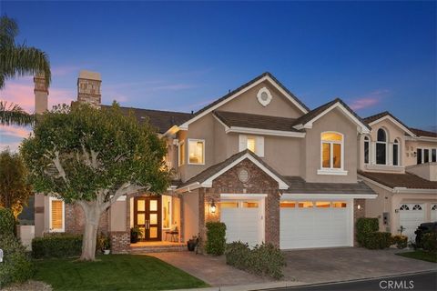 Welcome to 8 Sawmill, a home where luxury meets panoramic vistas, nestled in the esteemed Dove Canyon community. This residence stands as a testament to elegance, comfort, and privacy, offering a perfect sanctuary for family life and is located on a ...