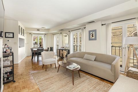 This true 2 bedroom, 2 bathroom apartment is located in the heart of the West Village and has everything you would want from a Village apartment: open concept common room, 22 windows (16 of them floor to ceiling), 9 Juliette balconies, a gas fireplac...