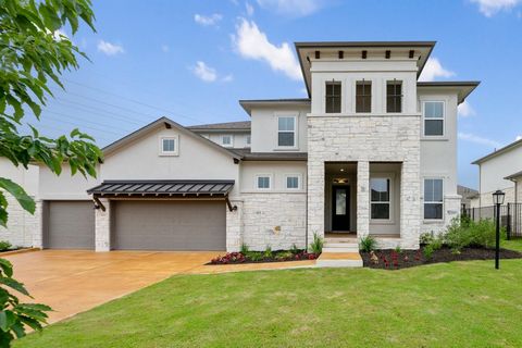 Welcome to your dream home in the prestigious Rough Hollow Lakeway! Nestled on a peaceful cul-de-sac, this luxurious 3900 sq ft residence promises unparalleled sophistication and functionality. Experience elegance with hardwood floors, a soaring two-...