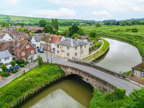 Built in 1833 and with a colourful history, Blann House is a distinguished Grade II listed Italianate villa-style property, notable for its unique and remarkable location. Positioned alongside the Monarch's Way, the River Adur and the historic Beedin...