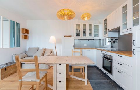 The furnished 2 bedroom apartment in Paris 16th district is on the 7th and last floor with elevator. It can be described as follows: - a main room with a dining table, a sofa and a coffee table - an open and equipped kitchen (oven, refrigerator, kitc...