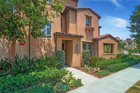 Welcome to this stunning townhome nestled in the prestigious Baker Ranch community, a true resort-style haven. This beautiful end unit with complete privacy features 1,936 square feet of living space, with three bedrooms, an extra-large bonus room, a...