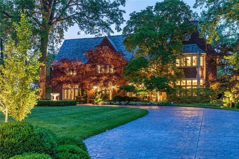Experience unparalleled luxury in this 1926 Tudor Revival, the first masterpiece by Maritz and Young on Lindell Blvd. Situated on historic grounds, once home to the 1904 Worldâs Fair Japanese Garden Exhibit, one of the country's oldest and largest Gi...
