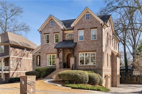 Discover this custom-built luxury home in the heart of Brookhaven, near restaurants, shops, parks, and private schools. This exceptional home features a bedroom on the main floor, a finished terrace level, a private backyard, and a spacious three-car...