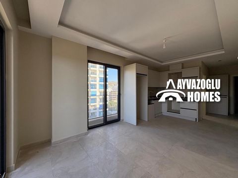 A 1+1 apartment with an area of ​​50 sq.m. is for sale in the Mahmutlar area. The layout of the apartment includes a living room combined with a kitchen, 1 bedroom. The apartment has been renovated with high-quality materials, the kitchen has a set w...