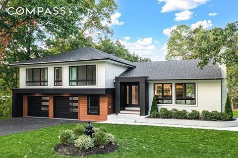 Indulge in modern luxury with this stunning home, set on a double 1/2 acre lot. This 4 bedroom, 4.5-bathroom home seamlessly blends chic style with an abundance of functional space. The architectural design is dramatic, showcasing soaring ceilings, a...