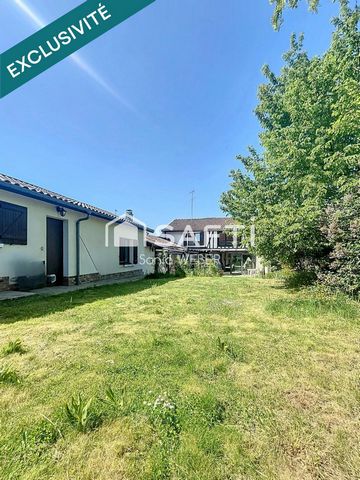 Petite ferme avec belle véranda, jardin et garage