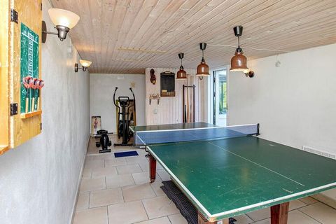 Spacious cottage for 12 people with whirlpool and sauna located on a large natural plot in Marielyst. There are six bedrooms on the 1st floor, four of which have double beds and two each have two single beds. On the 1st floor there is also a bathroom...