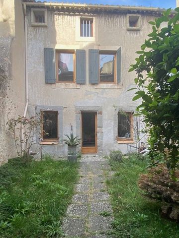 Bram center with garden of 40 m2, crossing 2 streets, real estate complex comprising a village house of character of approximately 160 m2, a garage of 40 m2 and an independent apartment type 2. The whole has been renovated in compliance with the mate...
