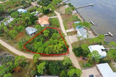 Welcome home! Site plan, survey, septic permit and engineered home plans all included in this beautiful corner lot on St George Island. Owner has put in all the hard work; all you have to do is hire your favorite contractor and choose your finishes. ...