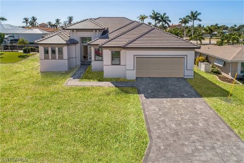 Welcome Home! Located in the highly desired area of Cape Coral this Gorgeous home is the Brand New Palm Beach 2 model built by Frey & Sons, and will be ready very soon. As you walk into the double entry glass doors you are greeted with a full view of...