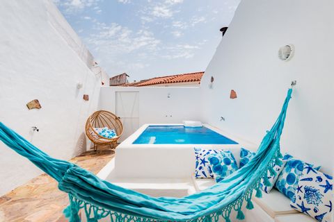 In the picturesque village of Alqueva, discover this cozy yet stylish retreat that seamlessly blends old typical architecture with modern amenities. Dive into the private pool, sizzle up delicious dinner on the barbecue, and bask in the rustic and in...
