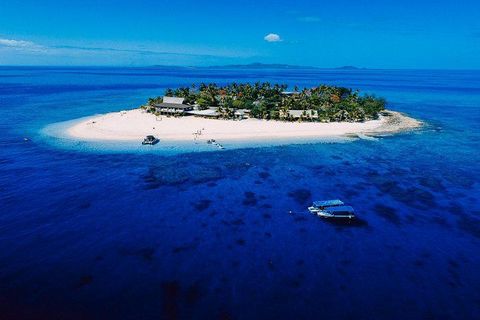A rare gem - a sprawling 27,316 sq. ft. piece of vacant land on Beachcomber Island, now available for purchase. This exclusive property presents an extraordinary opportunity to own or develop a slice of heaven with a 99-year tourism lease from 2008. ...