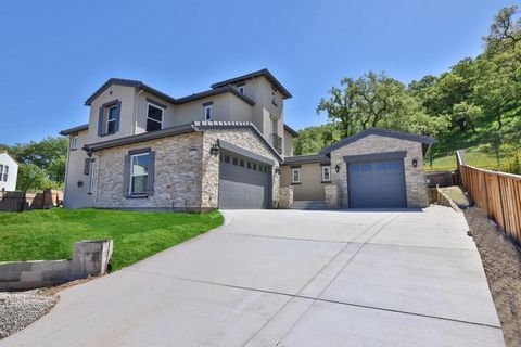 Gorgeous newly built home in prestigious Eagle Ridge Country Club within minutes walk to the club house. As you enter the home, you are welcomed to a vast open area full of natural light and ready to organize any way you like. All 4 bedrooms are en s...