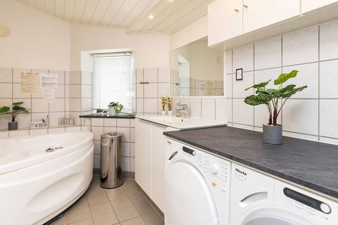 Charming cottage with sauna very well located close to Grønhøj Strand. The house is located on an elevation, on a lovely natural plot, with a good panoramic view of the area facing the sea. The cottage contains an open kitchen-dining room and a cozy ...