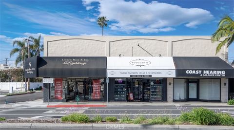 Prime ocean side corner location along Pacific Coast Highway offering unparalleled drive by and pedestrian visibility in sought after Corona Del Mar. This commercial property currently featuring 3 retail stores provides ease of access at pedestrian l...