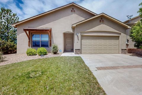 You'll feel right at home in this gorgeous light and bright Paul Allen home on a premium corner lot in ABQ's Saltillo neighborhood! Features include an open floor plan with 2x6 construction, 3 bedrooms, 2 baths and custom up/down light filtering/blac...