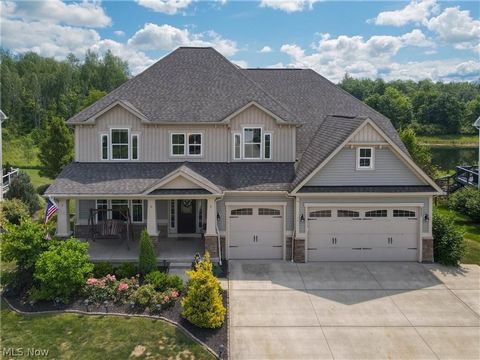 Welcome to 8025 Megan Meadow Dr a modern five bedroom colonial that backs up to Tinkerâs Creek Natures Preserve where the wild life greets you daily. As you arrive you will immediately be impressed with gorgeous landscaping and covered from porch. En...