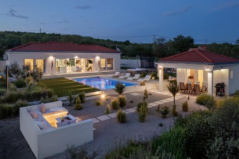 Location: Šibenik Built: 2021 Renovated: 2023 Šibenik center: 35 km Sea: 8 km Airport distance: 29 km Inside space: 120 m2 Plot size: 1034 m2 Bedrooms: 2 Bathrooms: 3 Swimming pool: 32 m2 Parking: 4 Air-conditioner Cameras Patio Playground Garden Fea...