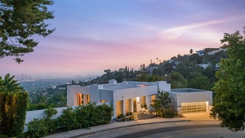 Introducing 1654 N. Doheny Drive, an unparalleled architectural masterpiece nestled in the prestigious Doheny Estates. This remarkable home offers impressive city views and was meticulously reimagined with the finest finishes throughout, setting a ne...