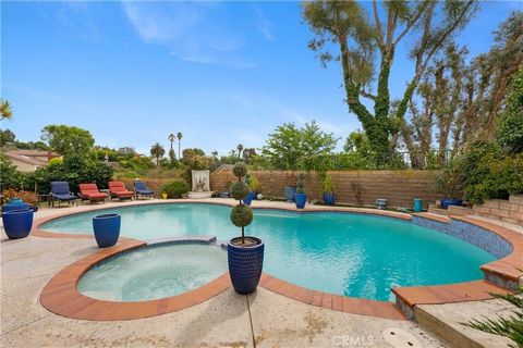 BRAND NEW ON THE MARKET!!! Resort Style POOL home with MULTIPLE distant VIEWS! Perfectly perched in the sought after rolling hills of central Mission Viejo with Stunning VIEWS toward the Front and Rear of the home! SUNRISE & SUNSET VIEWS! This FOUR B...
