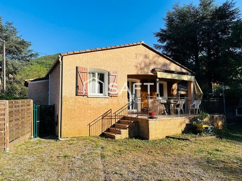 Maison de plan pied dans un écrin de verdure