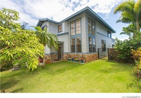Live on Royal Kunia Golf Course! This 3 bedroom, 3 bathroom home is right off the 14th green with a 2 vehicle garage. Split AC's in dining, master, and guest bedroom. Solar Electric. Upper and lower lanais with incredible views of the Honolulu skylin...