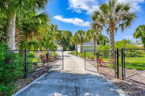 Pool home with Intracoastal Access! Yards away from the Intracoastal waterway lies this 3 BR/3 BA, private pool home on Saltwater Canal! Over one acre of space with fenced yard and protected boat dock + lift. In addition, a separate building/garage t...