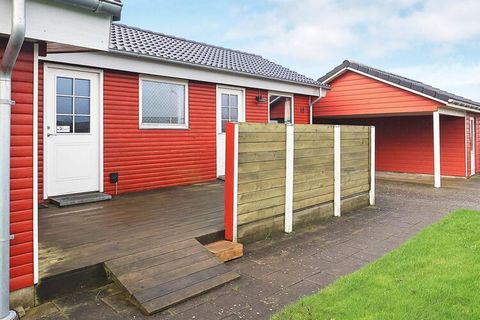 This holiday home is located overlooking the Limfjord by Livbjerggård on a 1300 m2 natural plot with a large lawn and trees that are suitable for children's play, and there is both a swing and a sandpit as well as a playhouse. There is also a cot and...