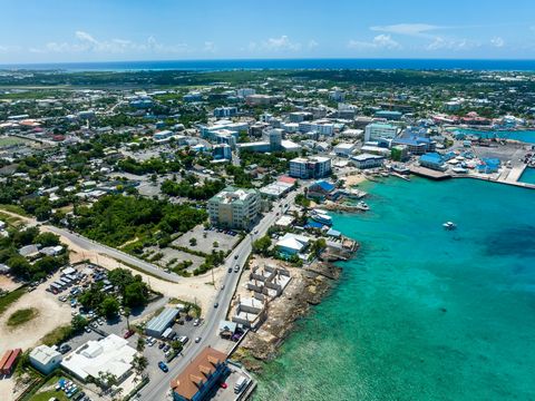 This prime location is poised for development. This is a once in a lifetime opportunity to own 6 commercial parcels facing the ocean in downtown George Town. The site offers ample room for commercial, retail and/or residential development with superb...