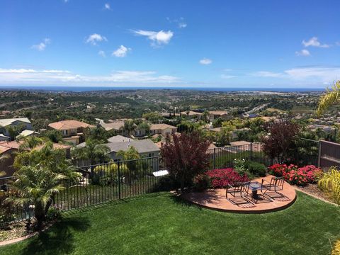 Unparalleled Panoramic Ocean, Valley and Sunset Views in exclusive Rancho Dorado! Lives like a single-story with the main-level primary suite. Peacefully situated atop the hills of San Marcos on a quiet cul-de-sac street, this immaculate home stands ...