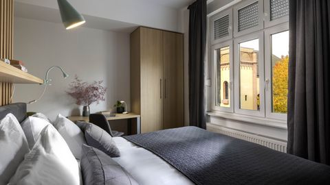 Step into the four-star luxury Colors of Music apart hotel! A safe and secure location just a 5-minute tram ride from the main square. The tram is literally two steps from the entrance. Walkscore rates us a 