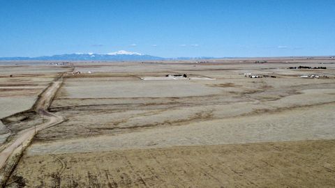 300 acre tilled dry land farm ground and 140 acres grassland east of Colorado Springs! Wide open spaces! Add to your farming or grazing operation, or build your farm. Towering views of Pikes Peak and views of the Spanish Peaks! Tons of road frontage ...