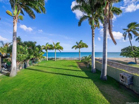 Imagine walking hand in hand on a white sandy beach in Hawaii. This one-of-a-kind property is located on a beautiful beach with a massive yard. Enjoy stunning ocean, sunset, and Diamond Head views. Relax on your open-air deck to soak in the views and...