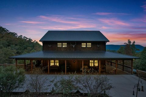 Welcome to your dream cabin retreat! This stunning 5 bedroom, 3.5 bathroom home nestled on 11.08 acres of picturesque land offers an abundance of features that will truly take your breath away. As you approach the cabin, you'll immediately notice the...