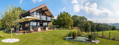Contemporary 5 bedroom villa close to the lake... Located in the heart of a quiet, residential area, this beautiful 163 m2 contemporary villa from the Dunoyer group. Designed in wood and glass, this spacious villa features light and contemporary arch...