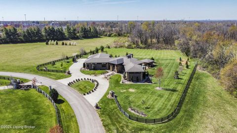 Discover this exquisite Arts and Crafts residence nestled within the prestigious gated Wolf Pen Estates Community. Spanning over 5 acres, this home boasts 4 bedrooms, including 2 primary suites on the first floor, 4.5 bathrooms, a bedroom/office, and...