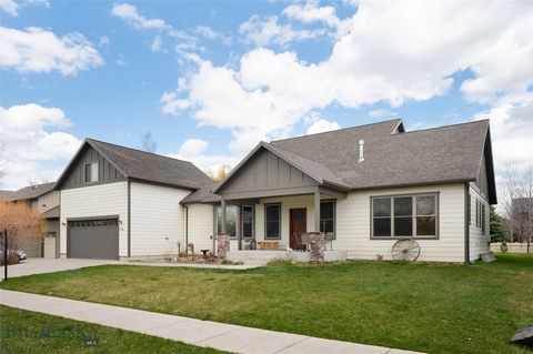 Welcome to 3726 Bungalow Lane located in the West Meadow subdivision. This stunning home is filled with natural light. The main level offers an open floor plan with vaulted ceilings in the living room, a gas fireplace, and a master bedroom in additio...