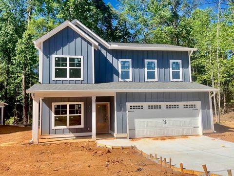 Stylish New Construction, Multi-family zoned, 4/3 home with open floor plan, 2 porches, attached 2 car garage on .63 acre lot, approximately 2 miles from Downtown Athens, UGA campuses, Piedmont hospital, is near Sandy Creek Nature Center, Holland Par...