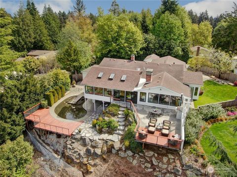 Discover a residence that delights in Normandy Park - with Lot A beach rights! Marvel at Puget Sound and Olympic Mountain views. Remodeled to perfection in recent years, this home features stunning details, exciting amenities, and expansive living ar...