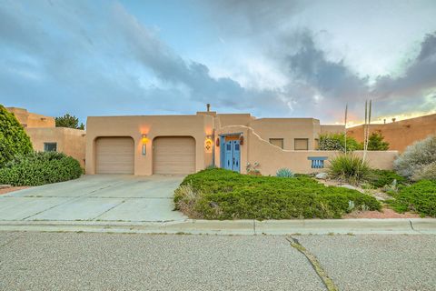 One story Pueblo custom home in a quiet prestigious Sandia Heights neighborhood on cul de sac. 3 bedroom plus office 2.5 bathrooms. Breath taking mountain views from enclosed courtyard. Cozy Kiva fireplace and high beamed ceiling in the living room. ...