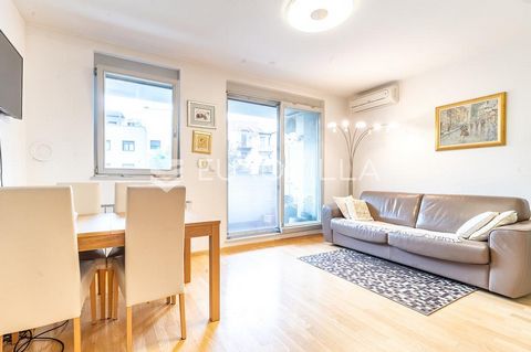 Zagreb Trešnjevka, functional one-room apartment NKP 44 m2 on the first floor of a residential building. It consists of an entrance area, living room with kitchen and dining room, bathroom, bedroom and balcony. Fully equipped and furnished with custo...