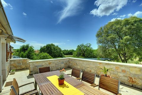This rustic holiday home is located in Valtura, near Pula, and has 3 bedrooms with private bathrooms. The property is ideal for a large group of friends or families with children. In the green Mediterranean garden is the private swimming pool with se...