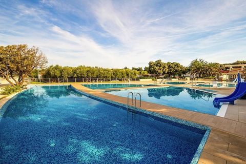 Spacious holiday complex directly on the gently sloping, beautiful pebble beach with modern and high-quality mobile homes. Depending on the location of the mobile home, it is only 20 to 200 meters to the beach, where two sun loungers are available pe...