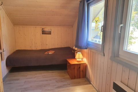 This inviting holiday home near Granzower Lake accommodates up to six guests with three bedrooms, a cozy living room featuring a fireplace, and a fully equipped kitchen for relaxed family meals. The interiors combine rustic charm with modern amenitie...