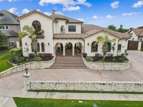 Step into resort-style living in the prestigious Stonebriar Country Club Estates, one of Frisco's most exclusive gated neighborhoods. Positioned between the 5th green & 6th tee box, this home exemplifies luxury living. Enjoy breathtaking sunset views...